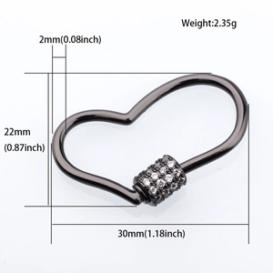 Macro detail of heart-shaped screw clasp with pave cubic zirconia and size dimensions