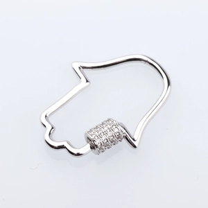 Macro detail of Hamsa hand screw clasp with micro-pave zirconia stones for DIY jewelry