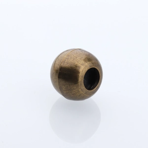 Macro shot of vintage bronze magnetic jewelry clasp for DIY bracelets and necklaces