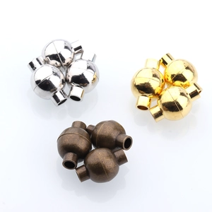 Macro shot of 10x14.5mm magnetic jewelry clasps in silver gold and bronze finish