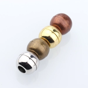 Macro shot of four-color spherical magnetic clasps for handmade DIY jewelry chains