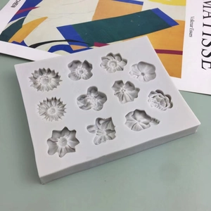 Grey silicone flower mold with 11 floral shapes for DIY fondant cakes and handmade soap