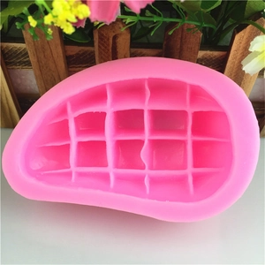 Pink mango shaped silicone mold with grid texture for fondant and chocolate baking