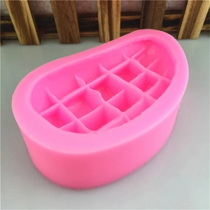 Pink silicone mango-shaped mold with waffle texture for cake and soap making