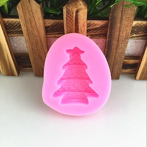 Pink silicone Christmas tree mold for DIY handmade soap, candles, and cake decorating