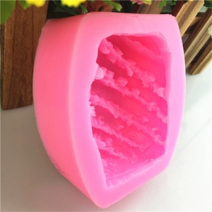 Moule en silicone rose pour savon ananas DIY avec des détails de texture roche