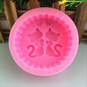 Pink silicone mold featuring two cats and hearts for fondant cake or chocolate making