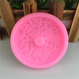 Pink silicone mold featuring traditional Chinese dragon, phoenix, and peony relief patterns
