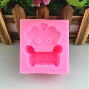 Pink silicone mold for 3D mini chair and sofa crafts, ideal for fondant and soap making
