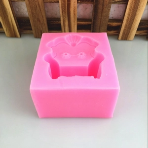 Pink silicone mold with crown emblem for fondant cake decorating and DIY resin crafts