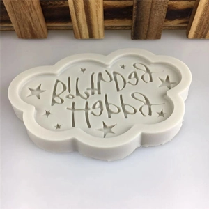 Cloud-shaped silicone mold with Happy Birthday and star patterns for cake decorating
