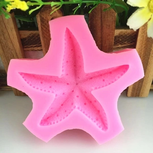 Pink silicone starfish mold for DIY chocolate baking and soap making with textured detail