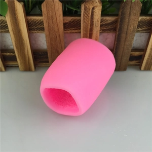 Pink silicone cylinder mold with internal spiral texture for DIY fondant and cake decorating
