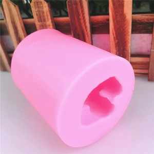 Pink silicone DIY mold for cute puppy shaped candles, soap, and fondant baking