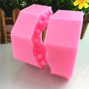 Pink silicone unicorn mousse mold with a two-piece interlocking design for DIY cakes