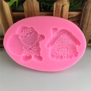 Pink silicone DIY Christmas mold featuring Santa Claus and a small cabin shape
