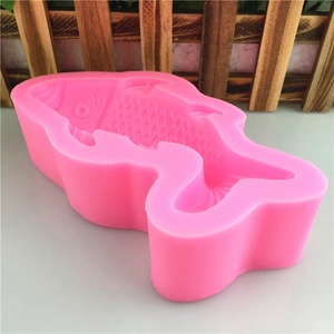 Pink silicone mold in carp shape for DIY 3D fish cakes and chocolate fondant making