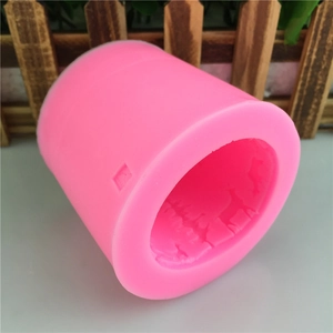 Pink silicone cylinder mold with 3D elk and cedar patterns for DIY Christmas candles