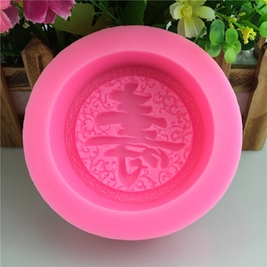 Pink silicone mold with Chinese Shou character for handmade soap and fondant baking