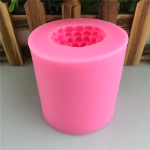 Stampo cilindrico in silicone rosa con trama a nido d'ape per candele e sapone fai da te