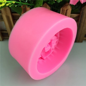 Pink cylindrical silicone mold for rose-shaped soap making and DIY candle crafts