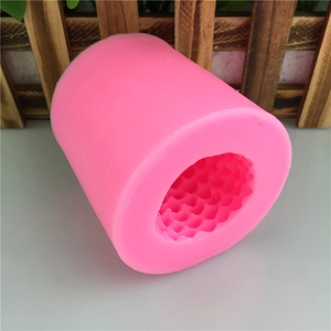 Stampo in silicone rosa con motivo a nido d'ape per candele e saponi fatti a mano
