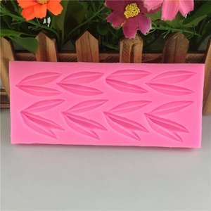 Pink silicone bamboo leaf mold for DIY baking with clear leaf vein textures