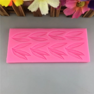 Pink silicone mold with 8-cavity bamboo leaf shapes for DIY fondant and chocolate decorating