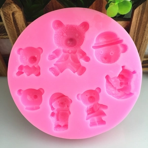 Stampo in silicone rosa con sette orsetti per cioccolato, fondente e decorazione torte