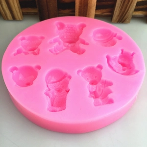 Stampo in silicone rosa con varie forme di orsi per decorazione di torte e cioccolato