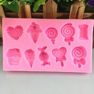 Pink silicone DIY mold featuring various candy, ice cream, and lollipop dessert shapes