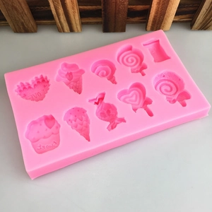 Pink silicone mold with ice cream, lollipop, and candy shapes for DIY fondant cakes