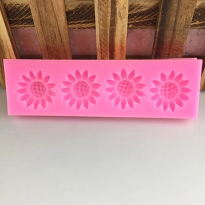 Pink sunflower silicone mold with four cavities for DIY fondant cake decoration and soap making