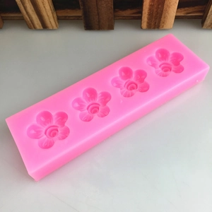 Pink 4-cavity silicone mold for 5-petal spiral flowers and DIY fondant cake decorating
