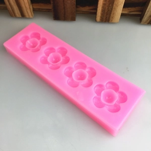 Pink silicone mold featuring four plum blossom cavities for DIY fondant and chocolate baking