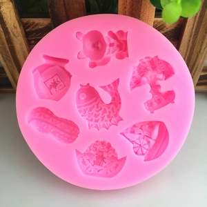 Pink silicone mold with traditional Chinese lucky symbols for cake and fondant