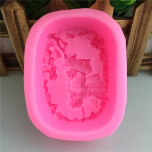 Pink silicone mold with embossed angel and flower girl design for DIY gypsum plaster craft