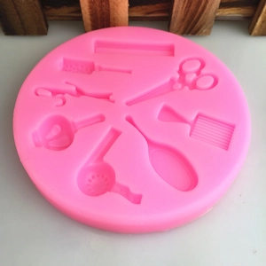 Pink silicone hair tool mold featuring scissors and comb for fondant cake decorating