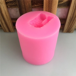 Pink 3D teddy bear silicone mold for candles and fondant cakes in a top-down view