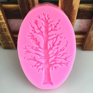 Pink silicone mold with leafless tree branch pattern for DIY fondant cake decorating