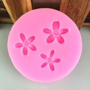 Bright pink silicone flower mold for DIY fondant, clay crafts, and cake decoration