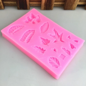 Stampo in silicone rosa con trame di foglie per decorazione di torte e fondente