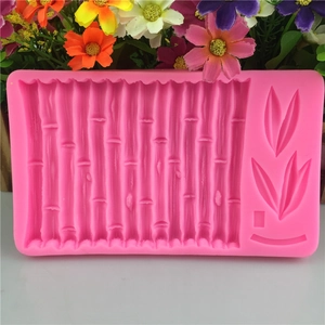 Pink silicone mold featuring bamboo stalks and leaves for fondant and cake decoration