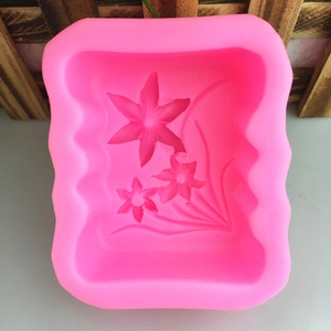 Pink silicone mold with narcissus flower patterns for DIY soap and candle making