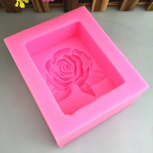 Pink silicone rose flower mold with detailed petals and leaves for DIY cake baking
