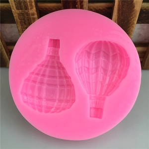 Pink silicone mold with two hot air balloon designs for DIY cake and chocolate crafts