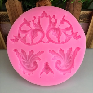 Pink round silicone mold with Baroque relief flower vine patterns for cake decoration