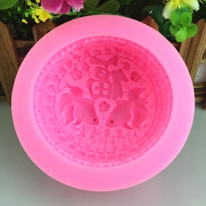 Pink silicone mold with Fu character and koi fish patterns for DIY soap and cakes