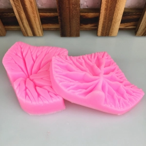 Pink silicone leaf veiner mold set for fondant cake decorating and DIY crafts