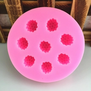 Pink silicone berry mold with 8 cavities for raspberry and blueberry fondant cake toppers